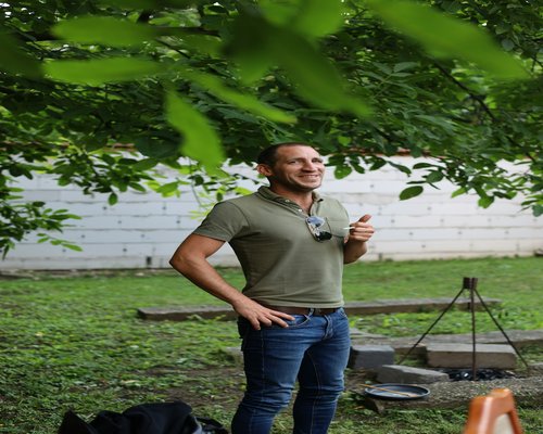Hungarian man enjoying a relaxed morning coffee before work